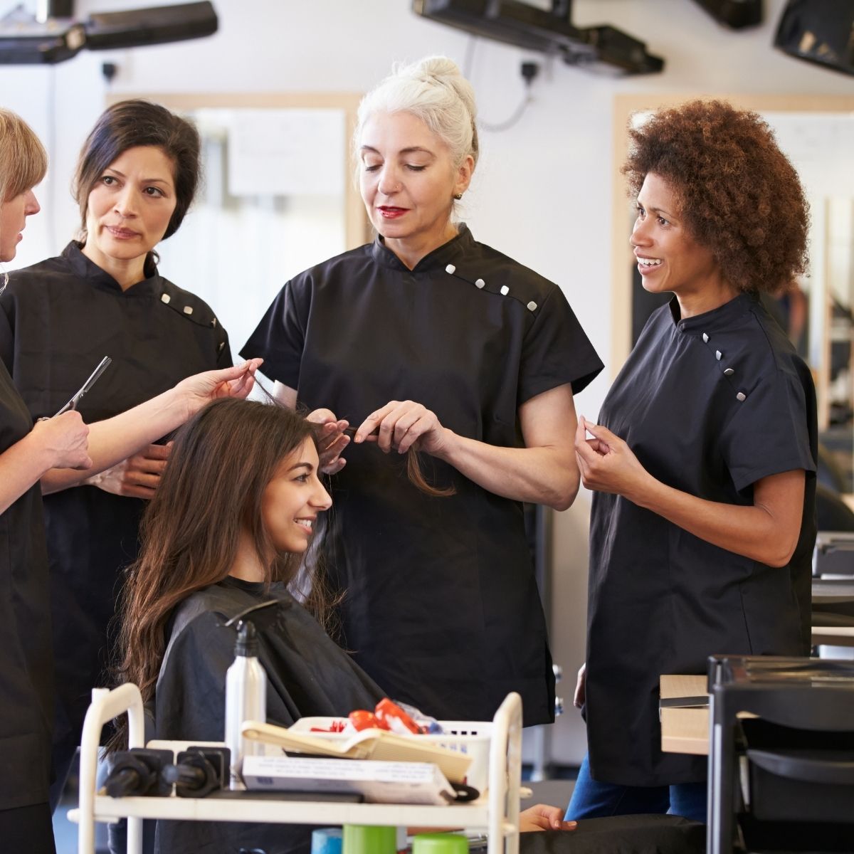 Hairdressers in a salon using Juntetsu Shears